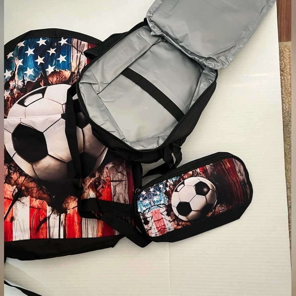 SCOROTEC BACKPACK SET (AMERICAN FLAG SOCCER) INCLUDES LUNCH BOX & PENCIL CASE.